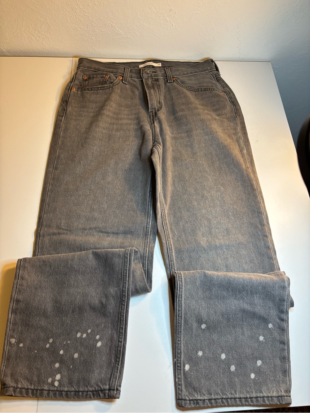 Levi's 505 gray denim jeans with white paint splatters